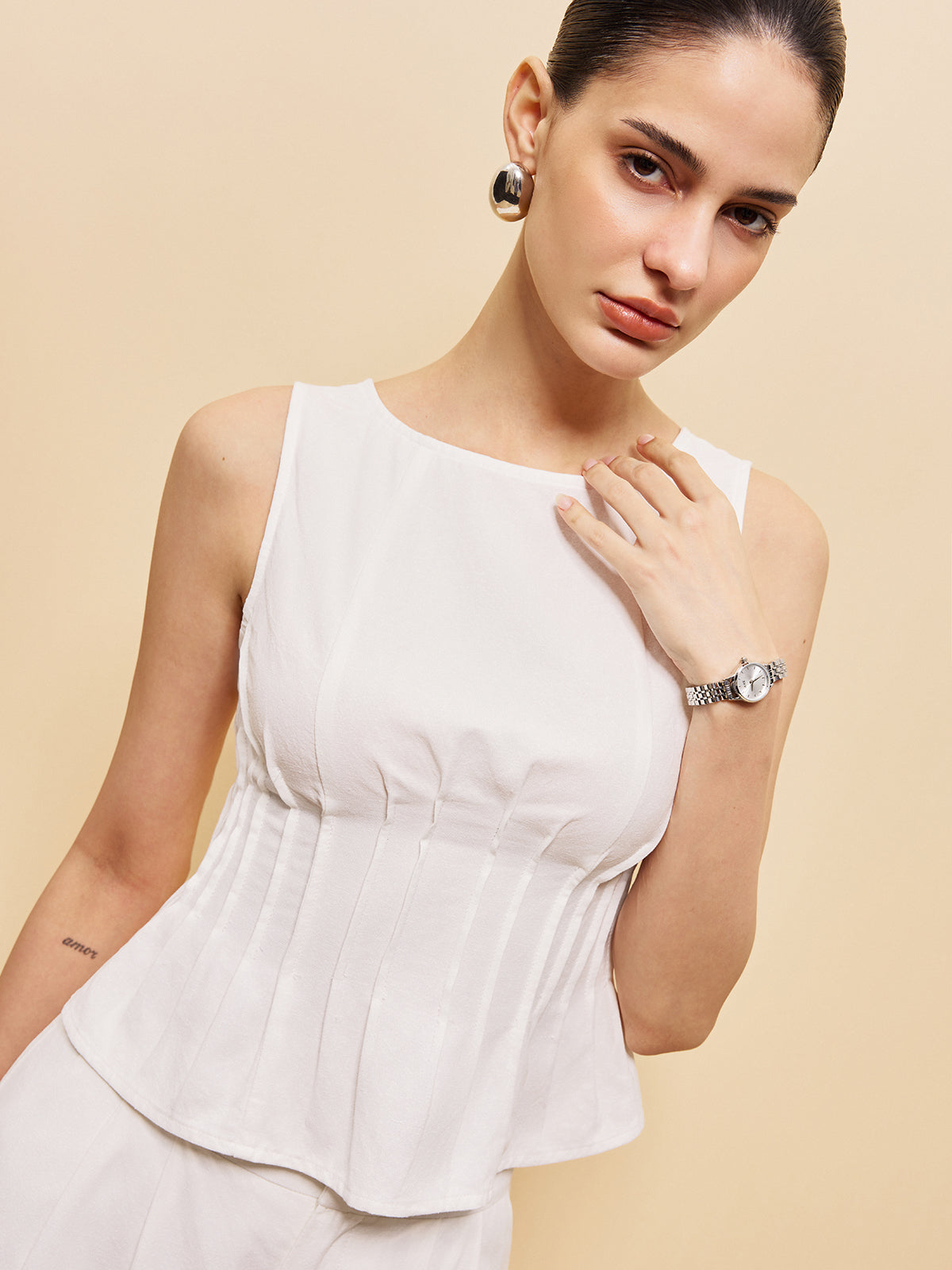 Şık Peplum Üst ve Dikkat Çekici Geniş Paça Pantolon Takımı