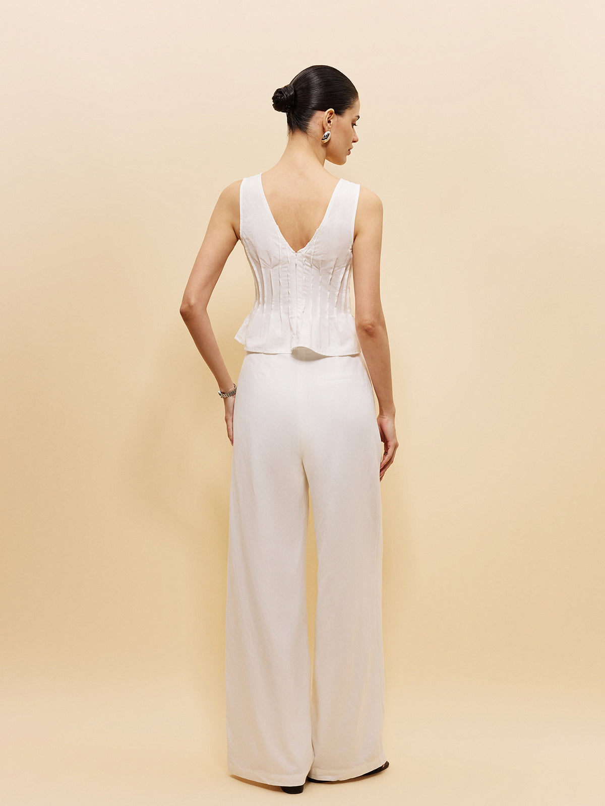 Şık Peplum Üst ve Dikkat Çekici Geniş Paça Pantolon Takımı