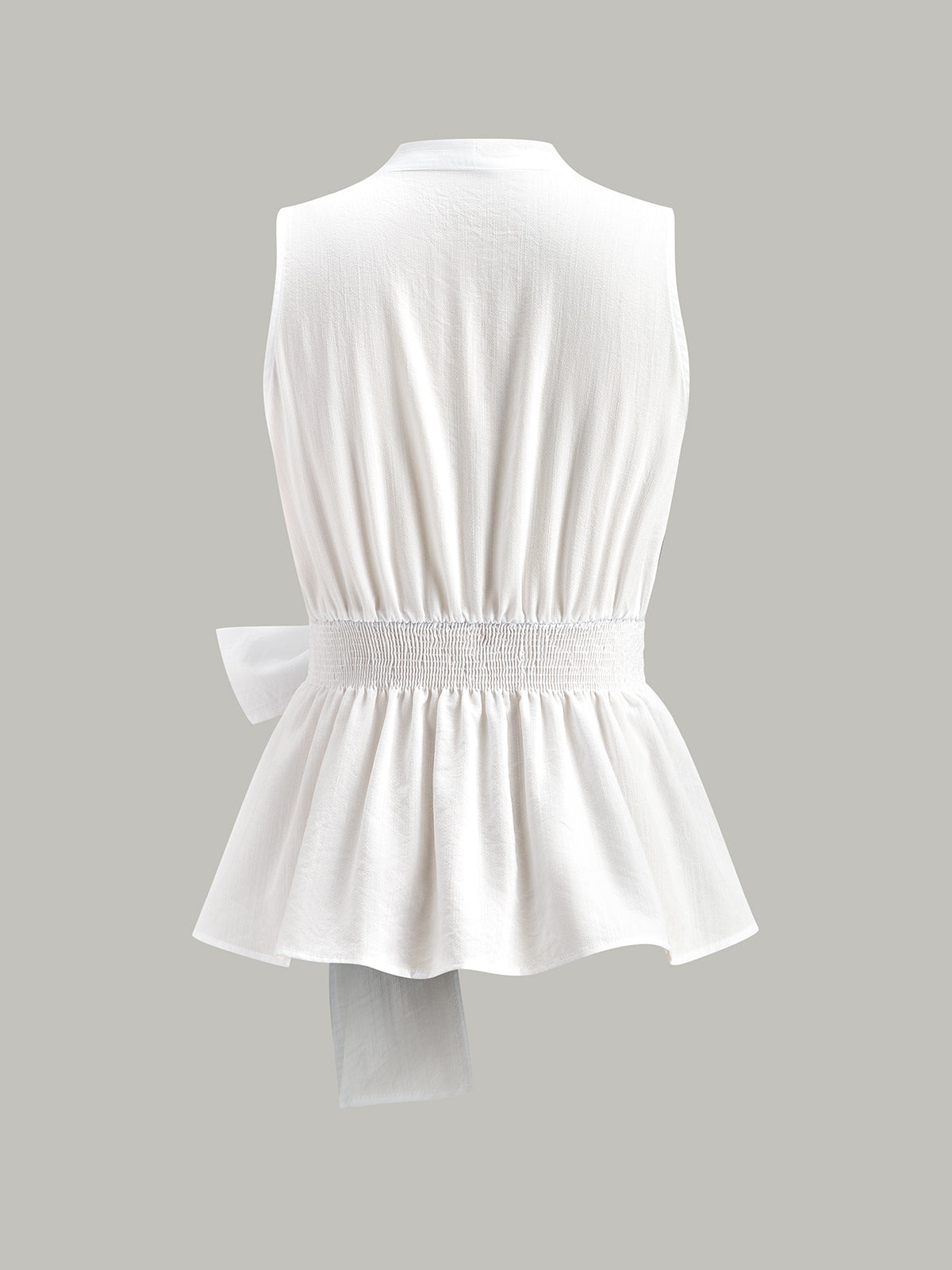 Şık detaylı peplum ve düğüm ile en iyi sarmalayan üst